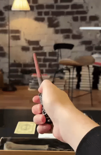 Pressing the trigger button on the Magical Fire Wand